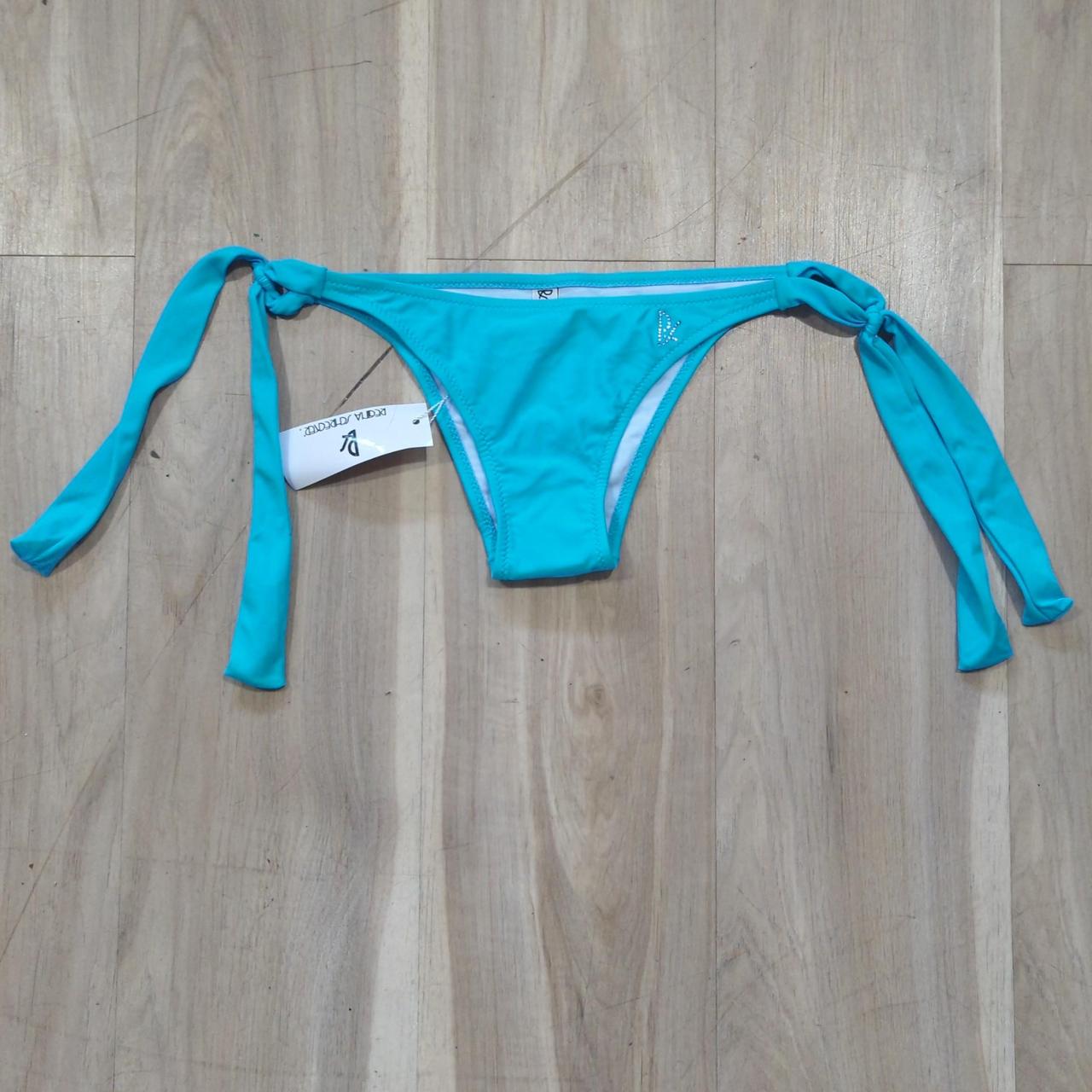 super low rise bikini bottoms with a cute gem emblem... - Depop