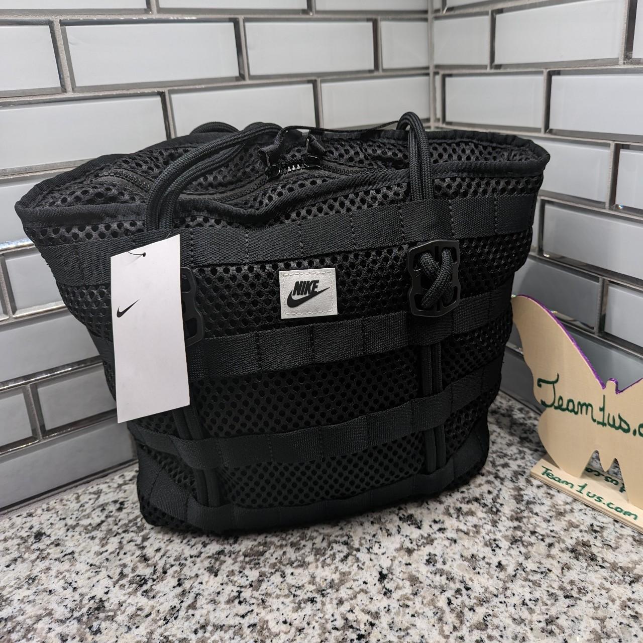 nike jacket that turns into a bag