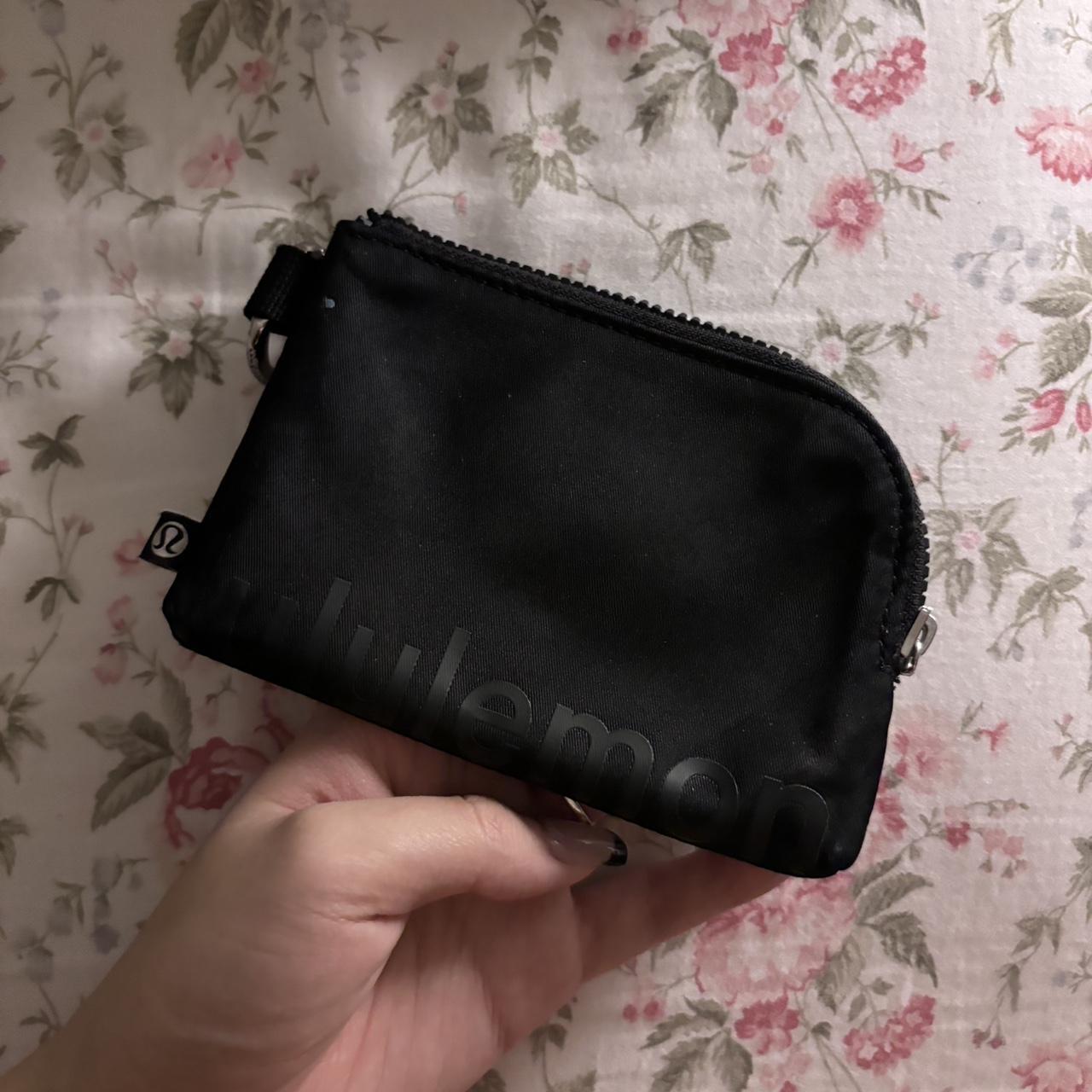 Black Lululemon wallet the key hook is scuffed and... - Depop