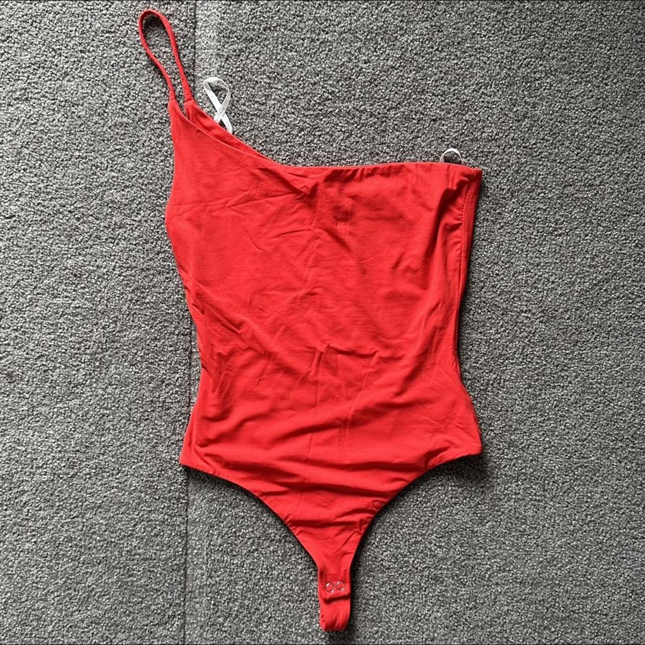 Red ivy bodysuit from kookai. Colour more similar to... - Depop