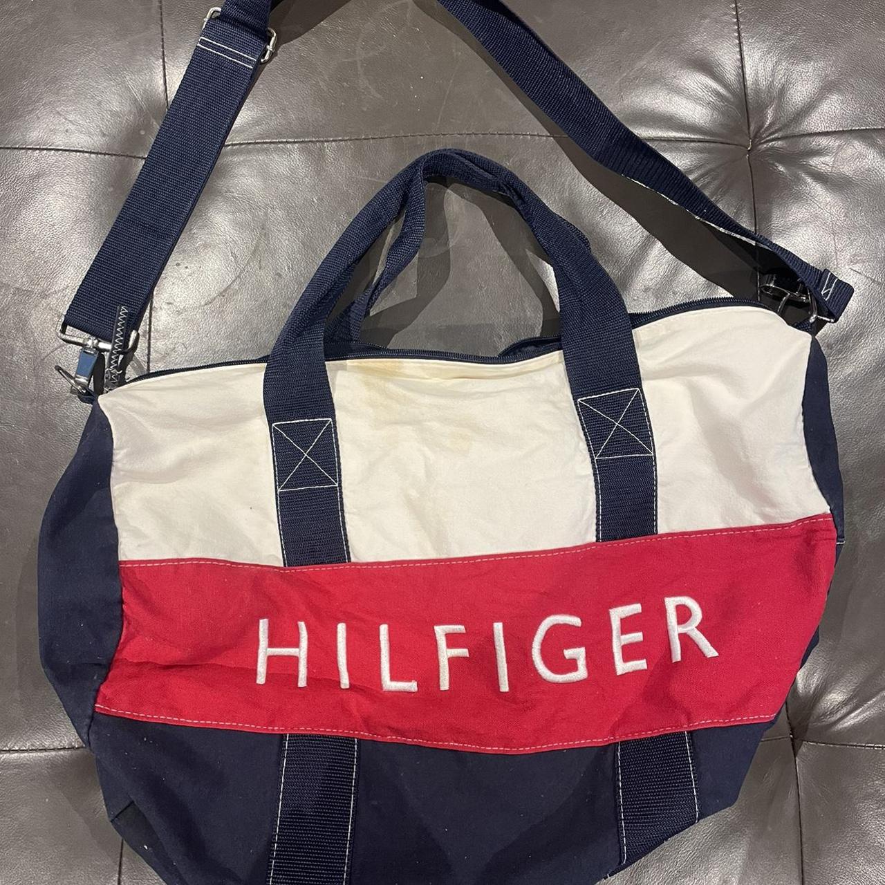 Tommy Hilfiger travel bag Broken zip and some stains... - Depop