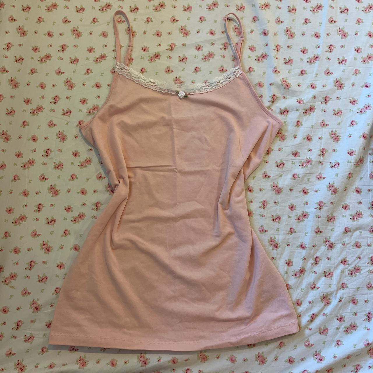 The cutest pale pink tank top! I added lace and a... Depop