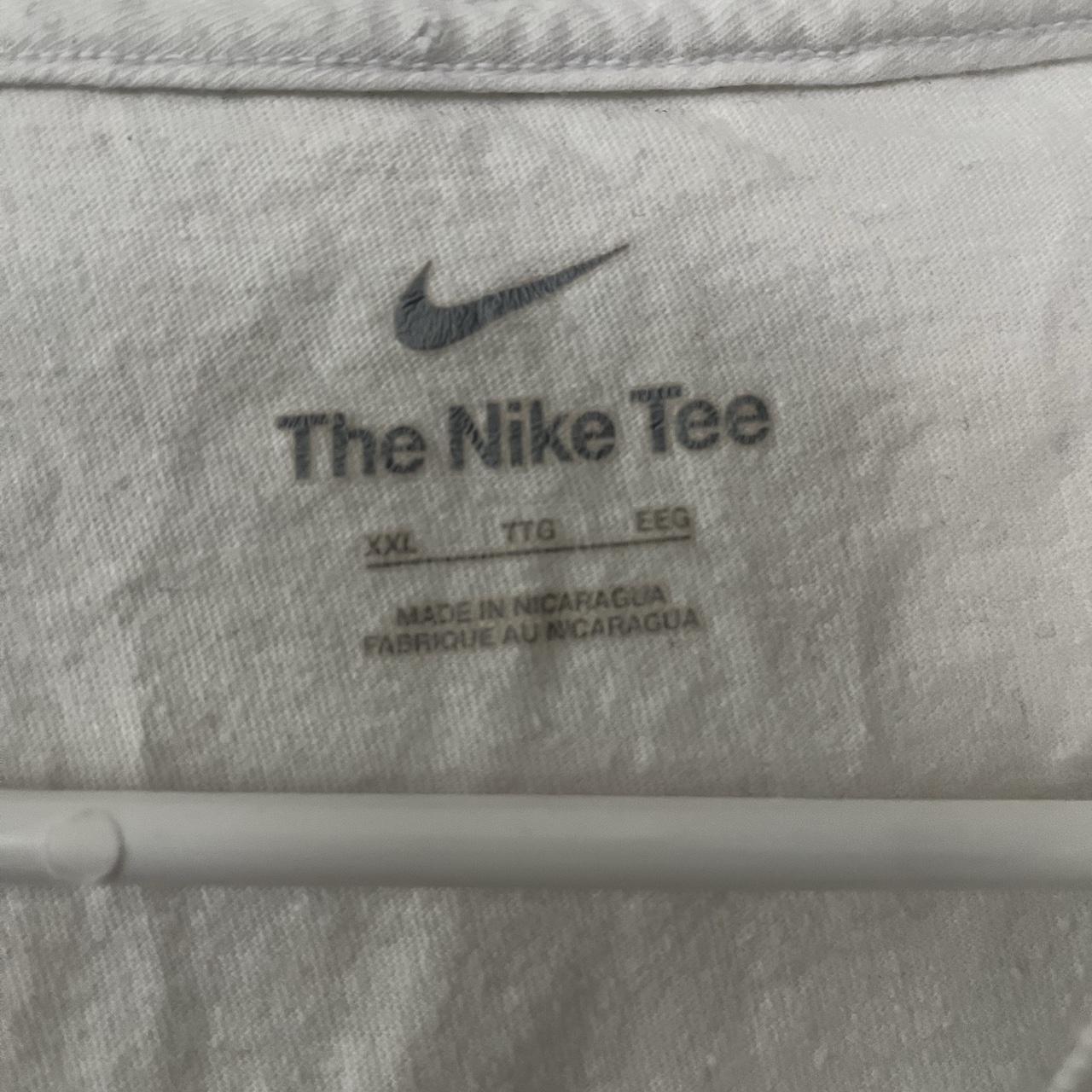 plain white nike shirt with black swoop it’s just a... - Depop