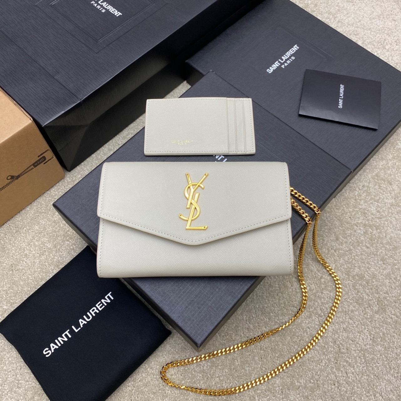 Yves Saint Laurent envelope bag with original box,... Depop