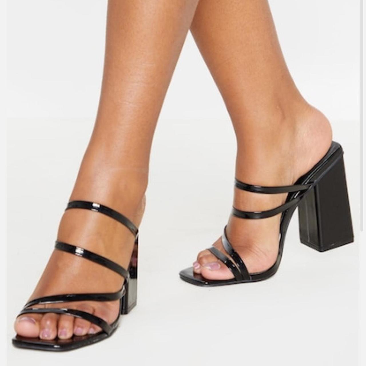 Strappy black mules online