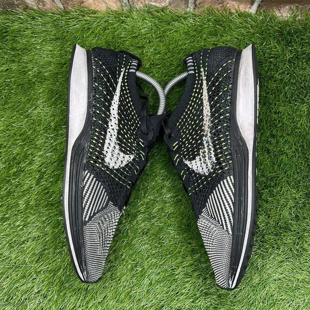 nike flyknit racer womens black and white
