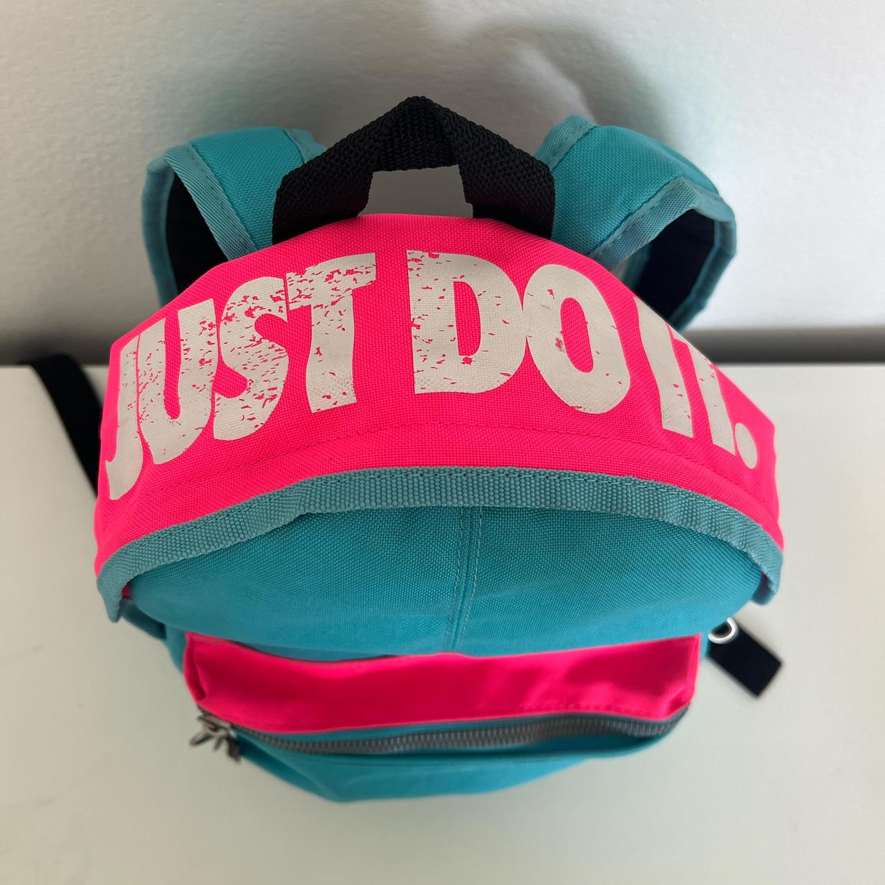 Blue and pink nike backpack sales