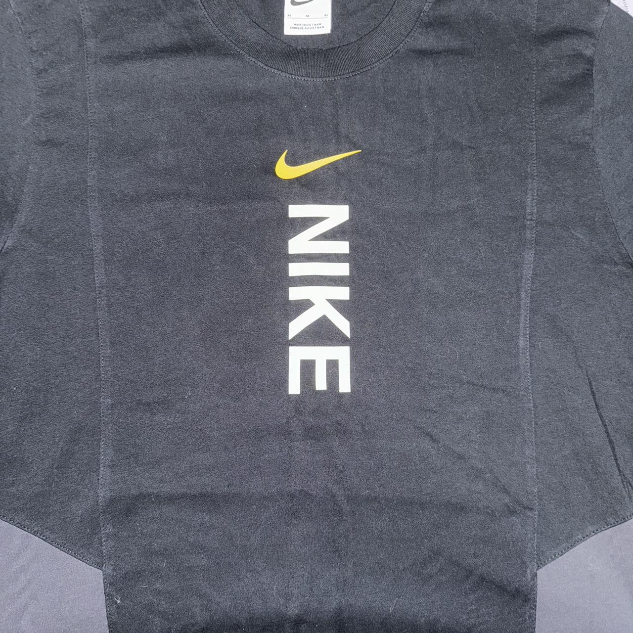 white nike yellow tick
