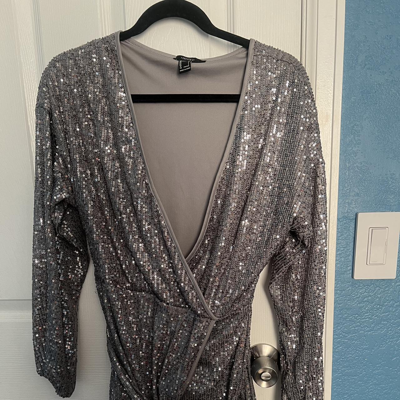 Short silver sequin long sleeve deep v cut dress