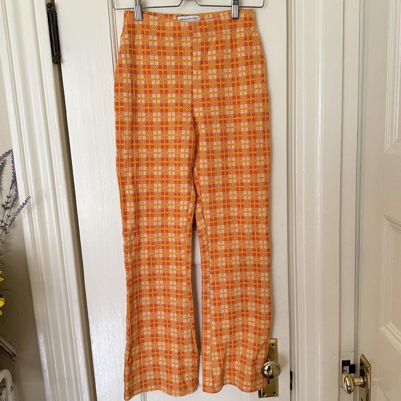 Bright orange plaid pants from Urban Outfitters.... - Depop