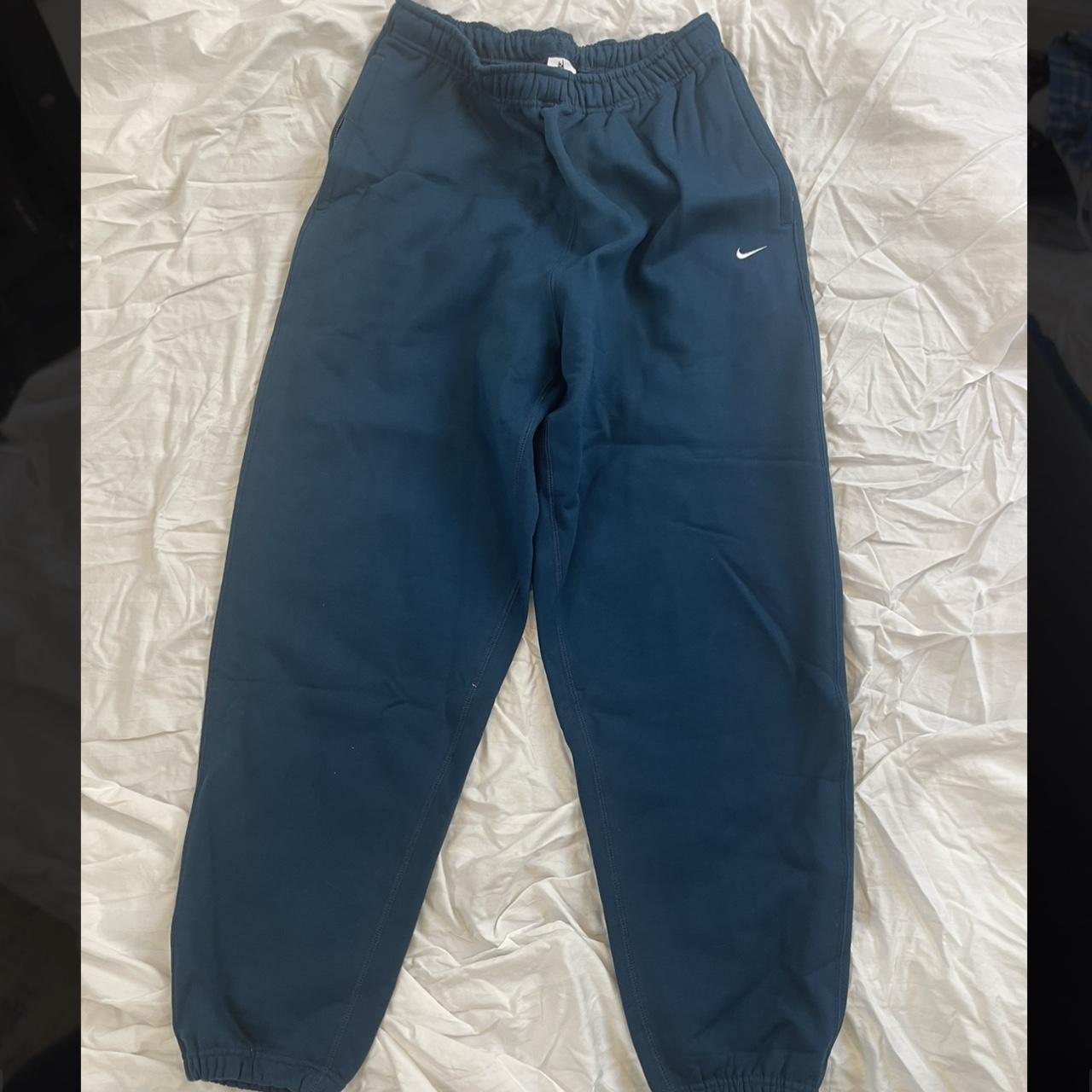 Turquoise nike online sweatpants