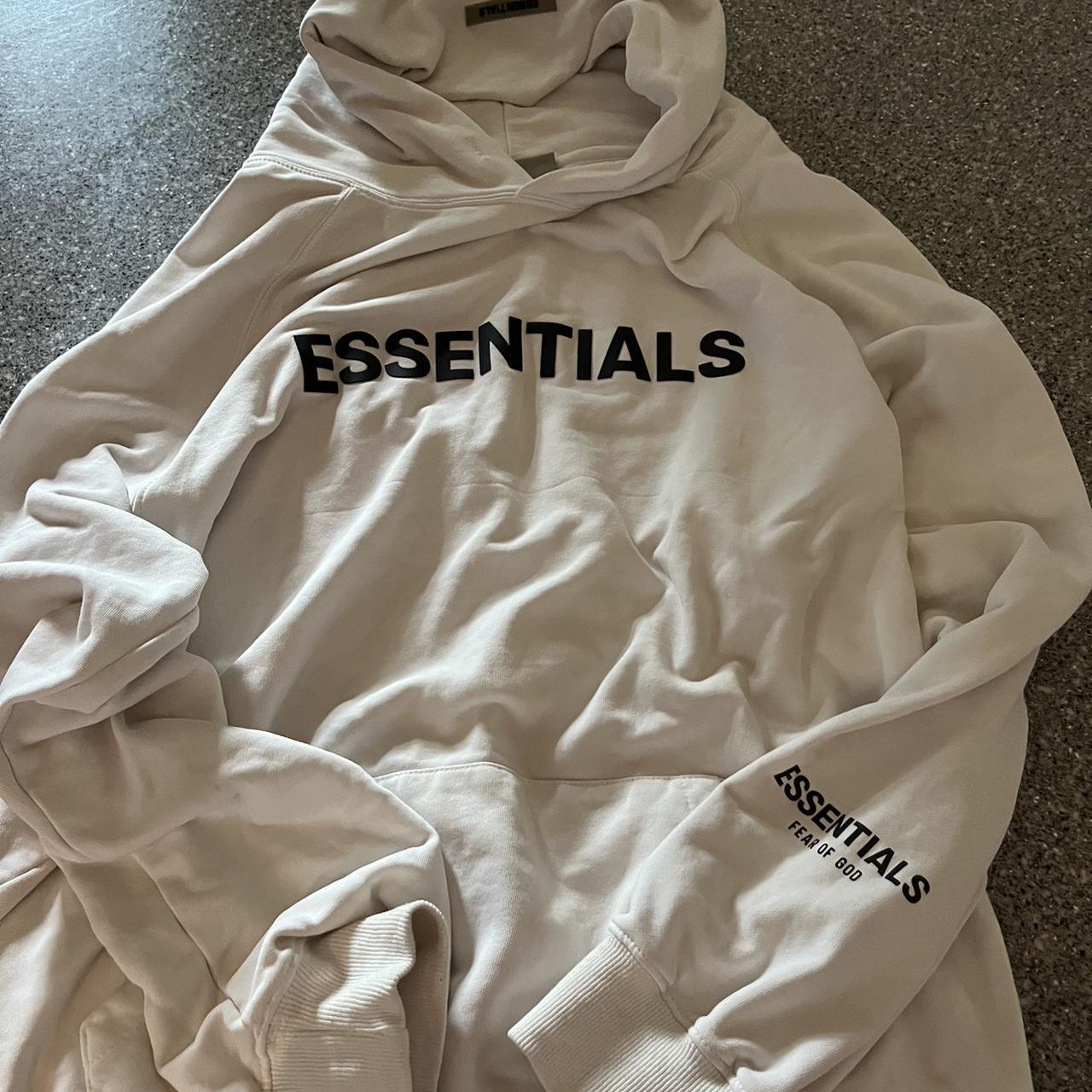 Cream. Essentials fear of God hoodie Large - Depop