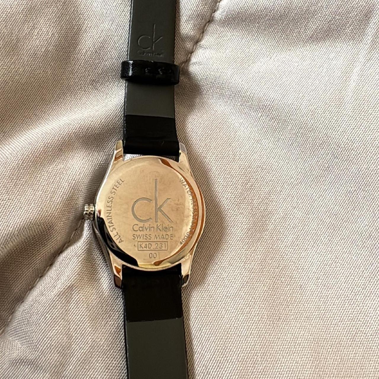 Genuine Women s Calvin Klein black face black band. Depop