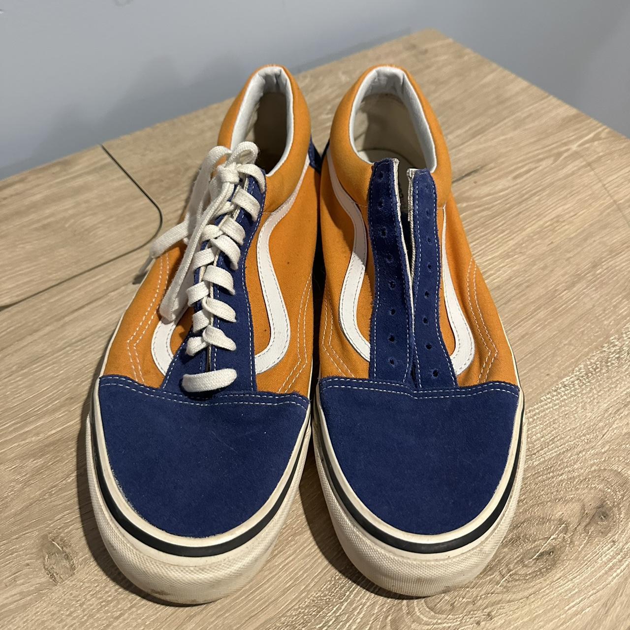 Blue and orange clearance vans