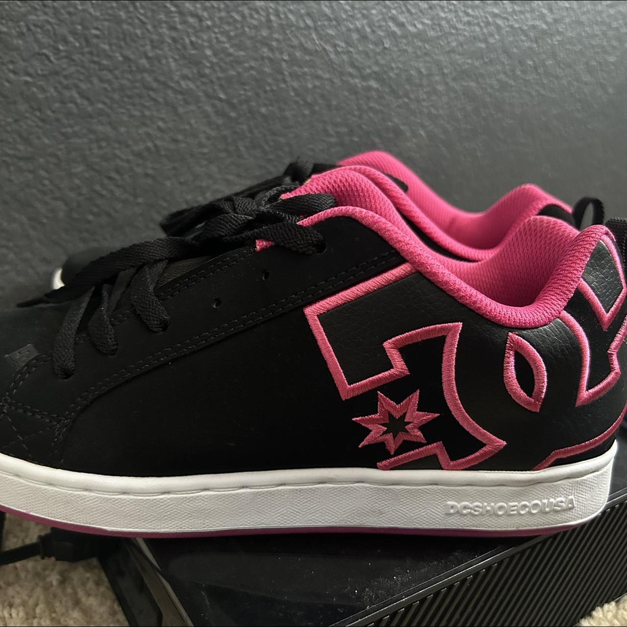 black and pink dc shoes