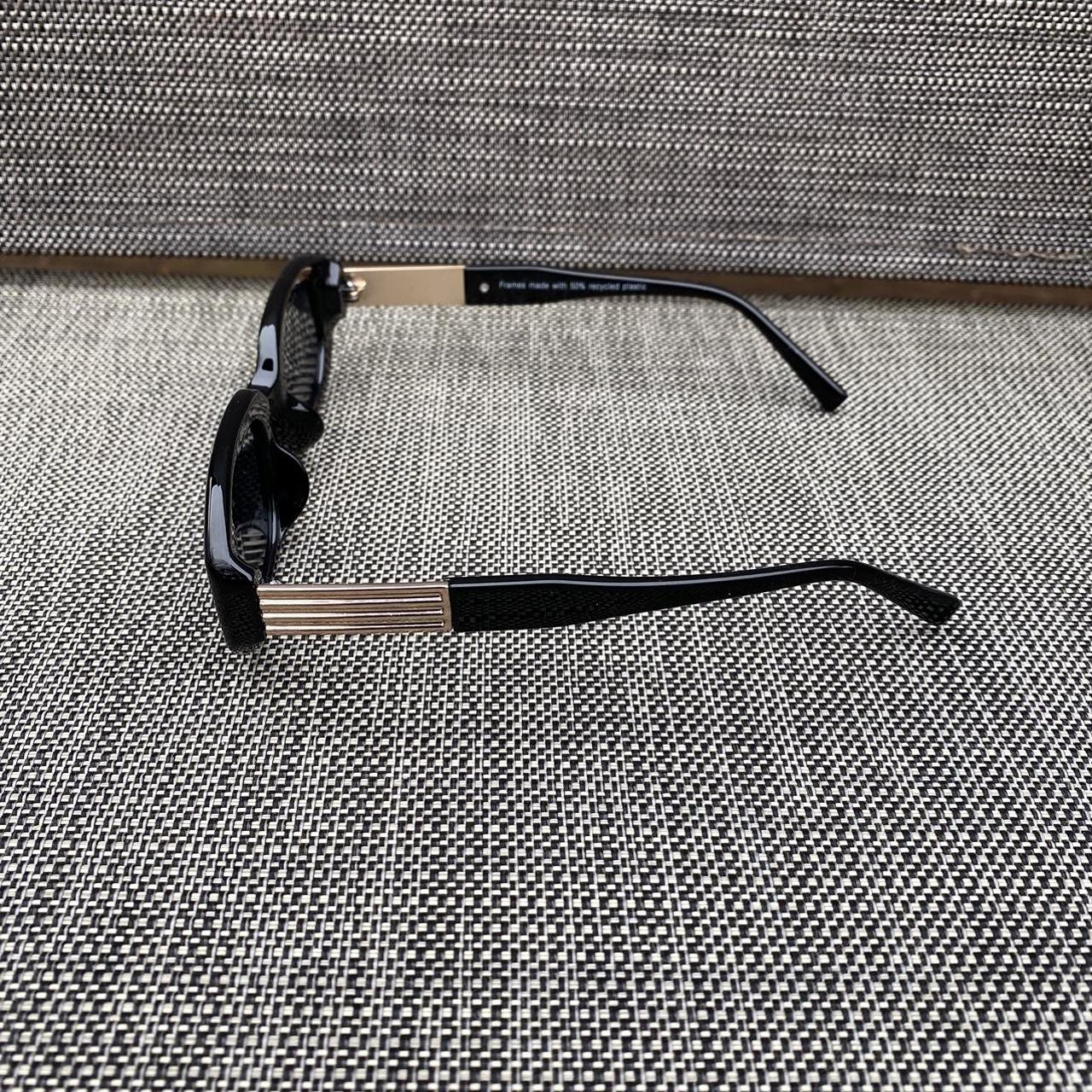 Review Women's Black and Gold Sunglasses | Depop