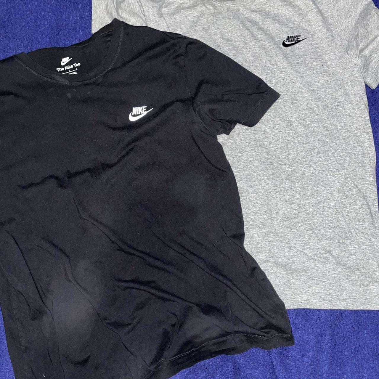Two men’s nike t shirts black= size L grey= size... Depop