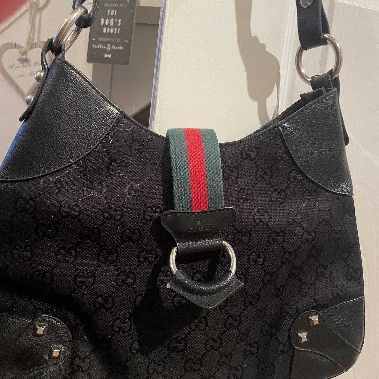Black Gucci shoulder bag, been used but does have... Depop