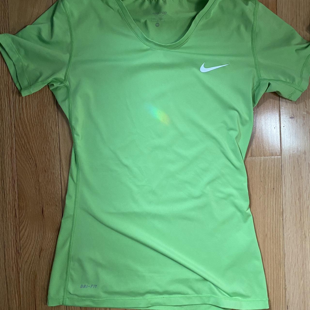 Fitted Nike athletic shirt. Bright green and very... - Depop