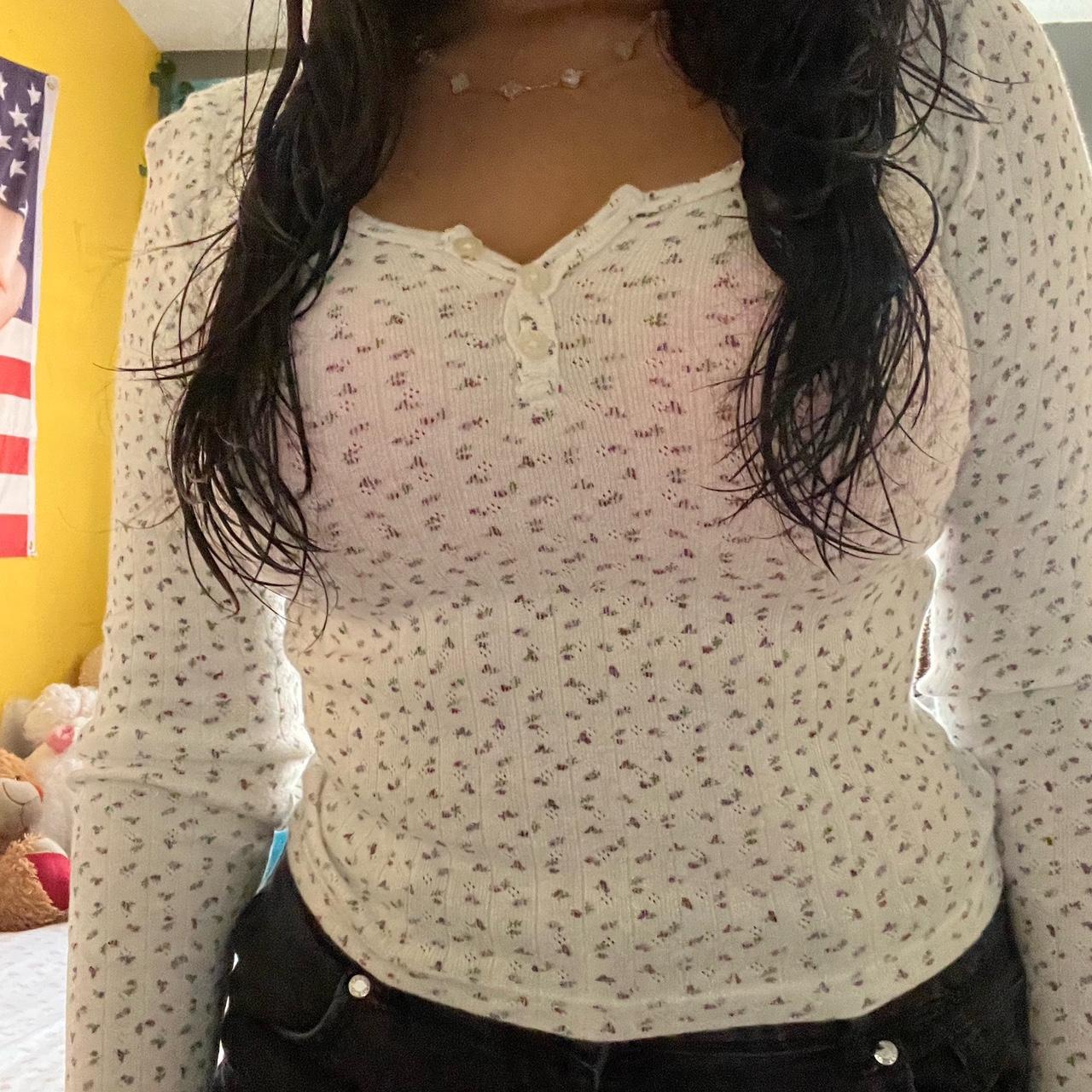 Zelly floral top with the cutest purple flower... Depop