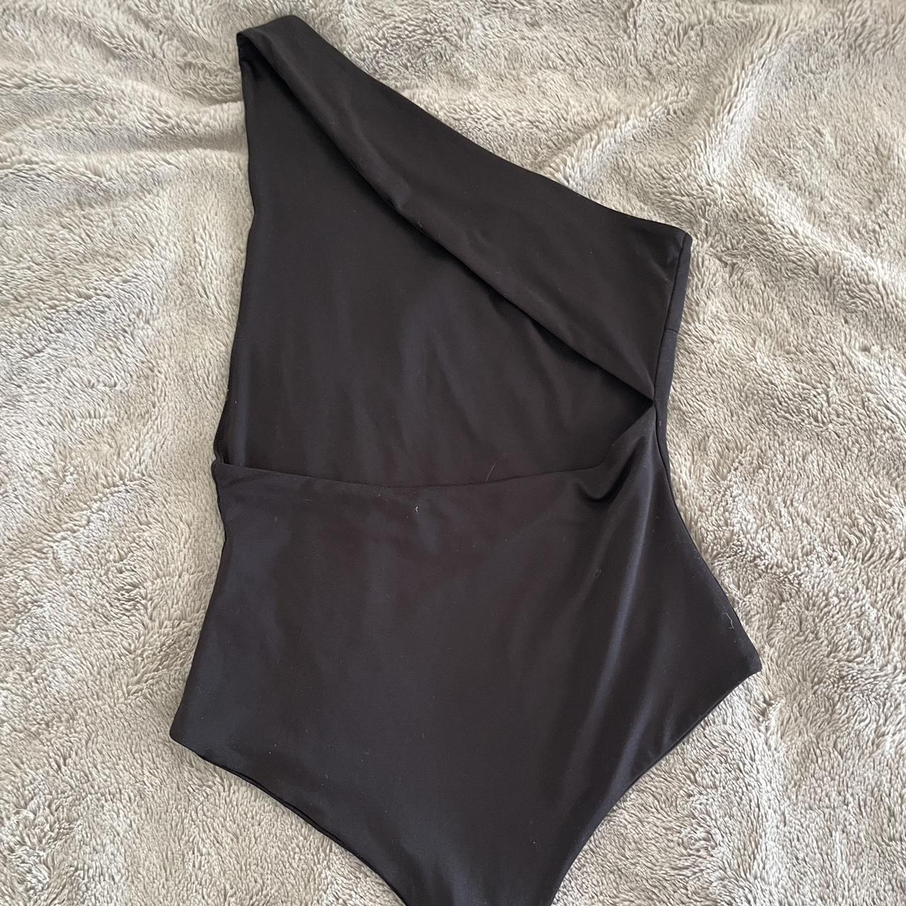 black bodysuit with a gorgeous back the brand is... - Depop