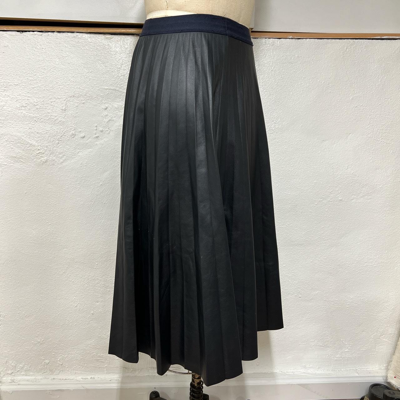 Theory pleated faux leather skirt. Tagged as L but... - Depop