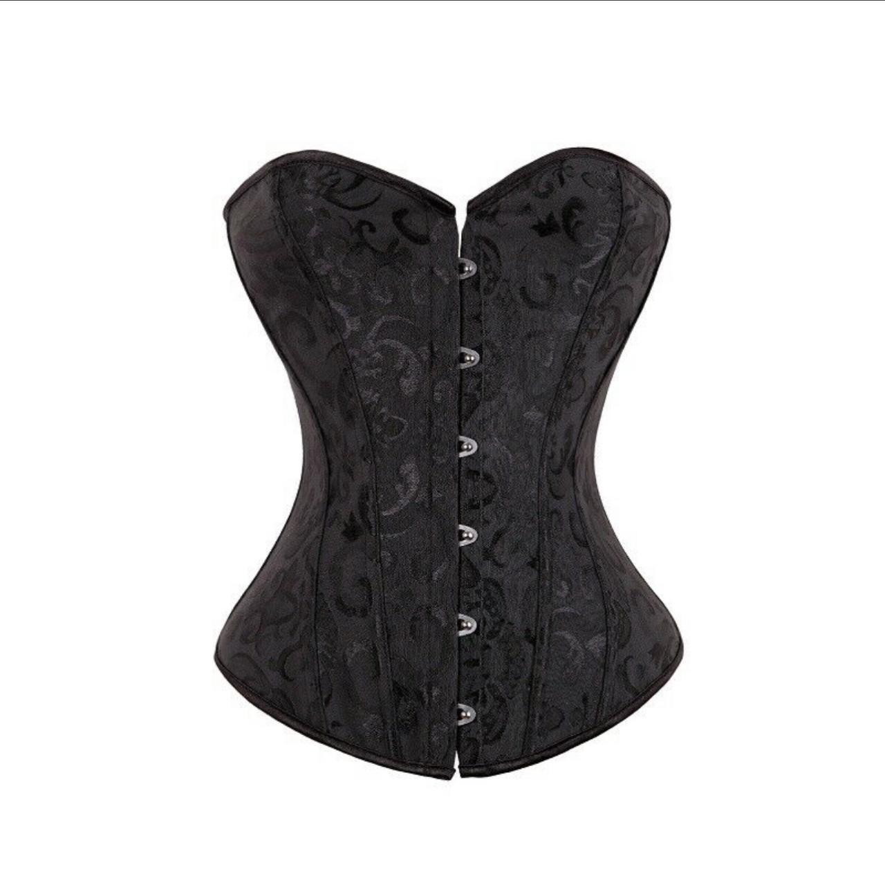 Black corset in a size small Free shipping... - Depop