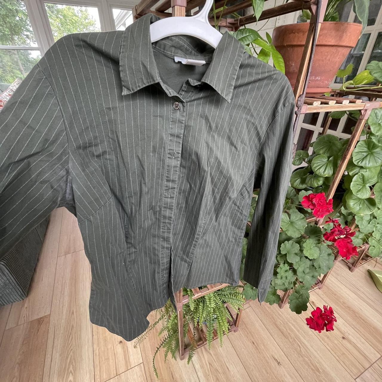 women’s green button down has served me well!... Depop