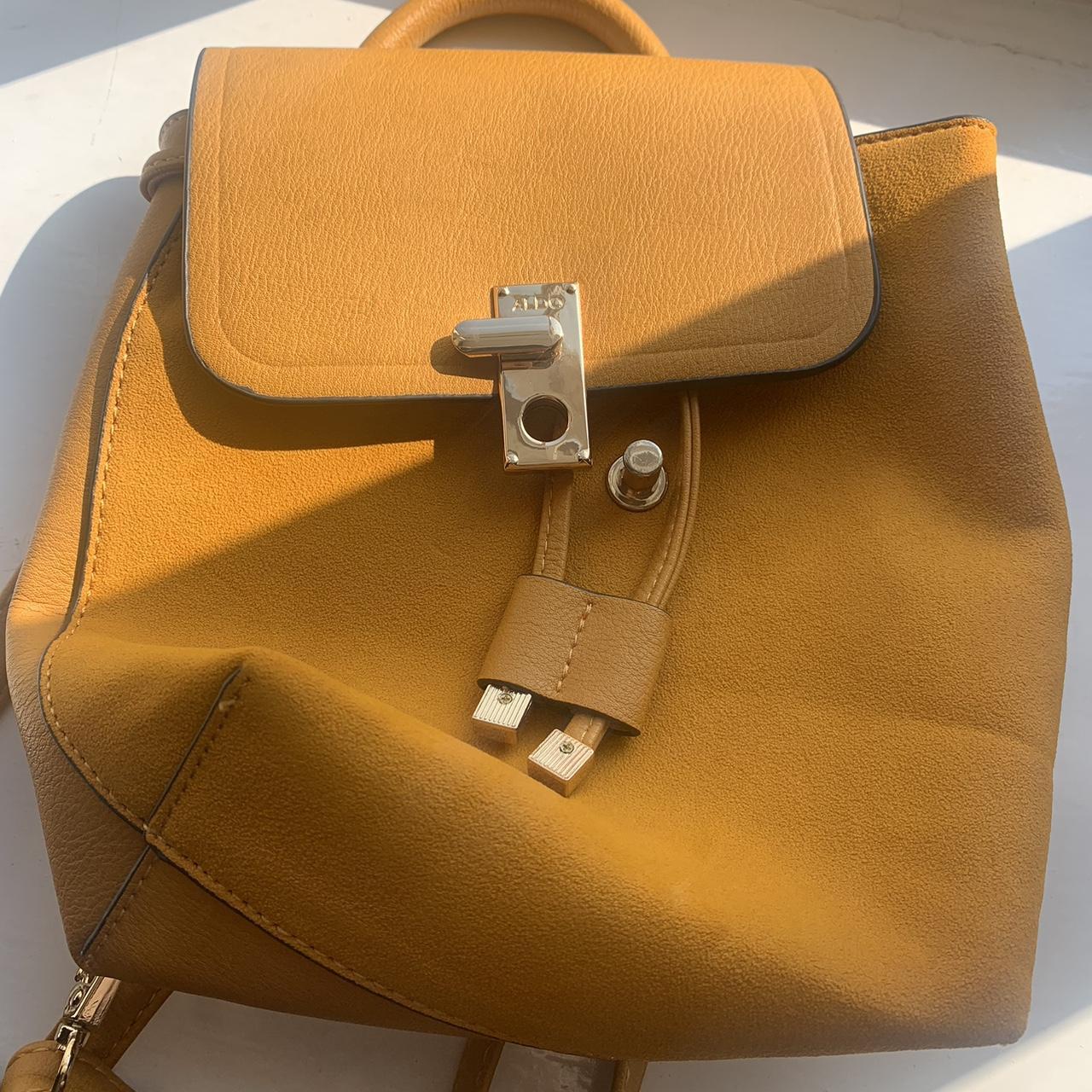 New Aldo mustard backpack purse. Worn once but the... Depop