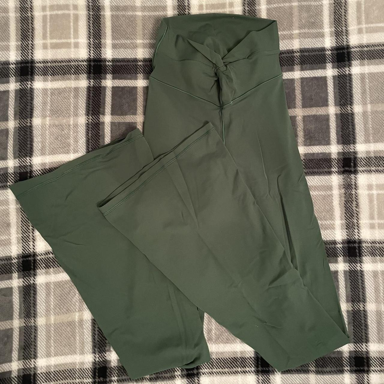 Green aerie flared leggings knot front. Long inseam Depop