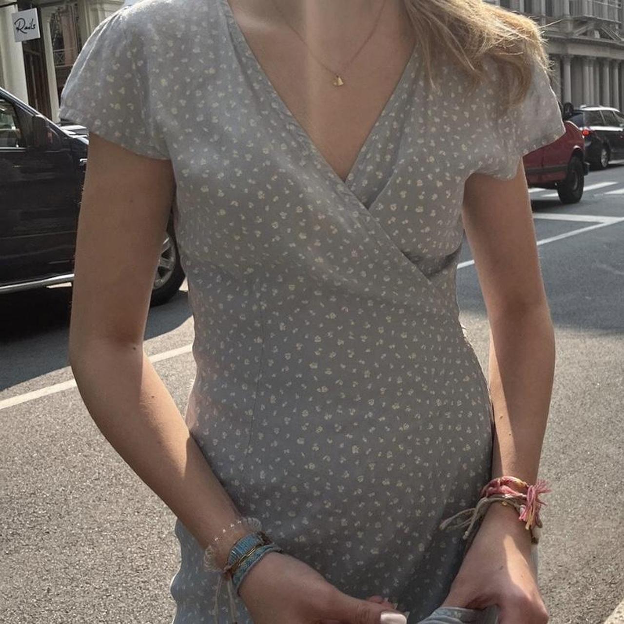 Brandy melville robbie dress blue with white floral... Depop