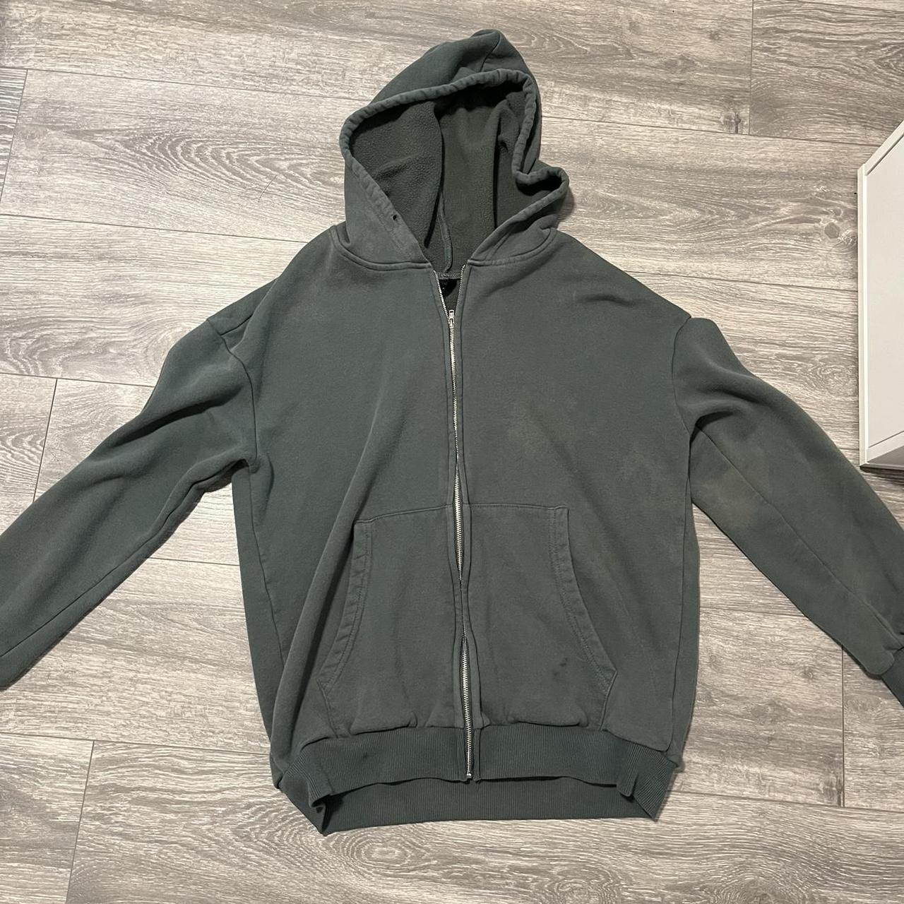 Forest green zip up hoodie -has a tiny... - Depop