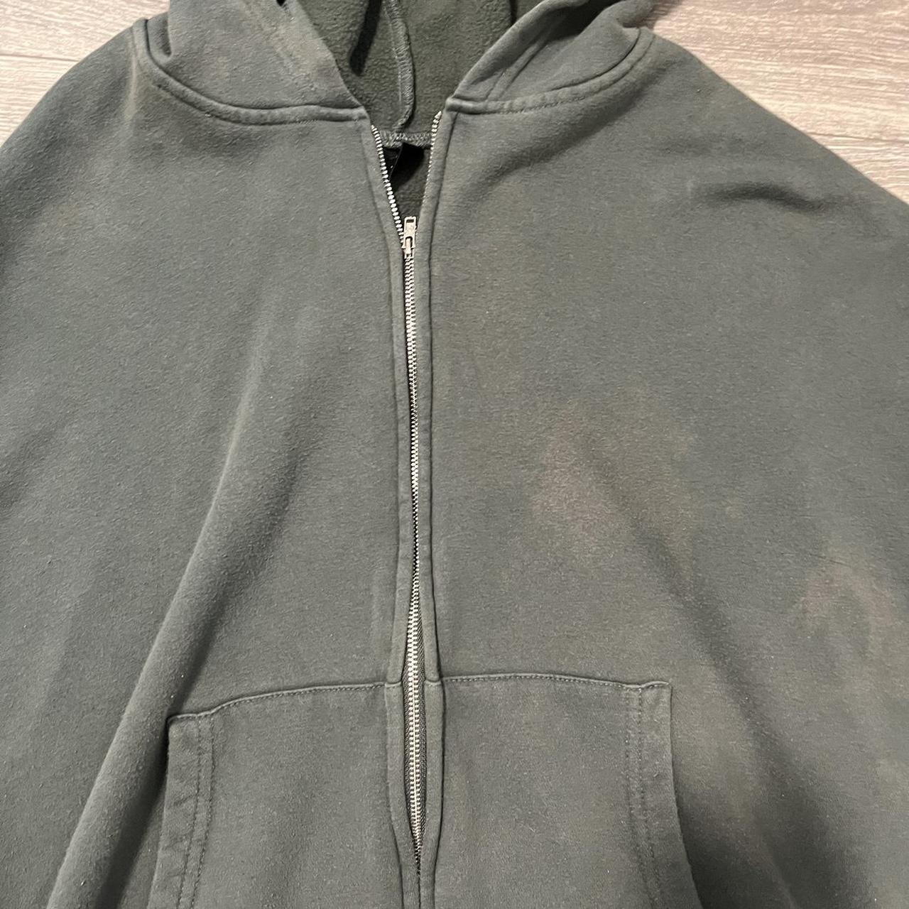 Forest green zip up hoodie -has a tiny... - Depop