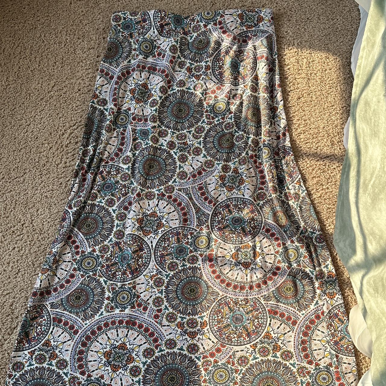 cute patterned skirt, never worn and fits medium to... - Depop