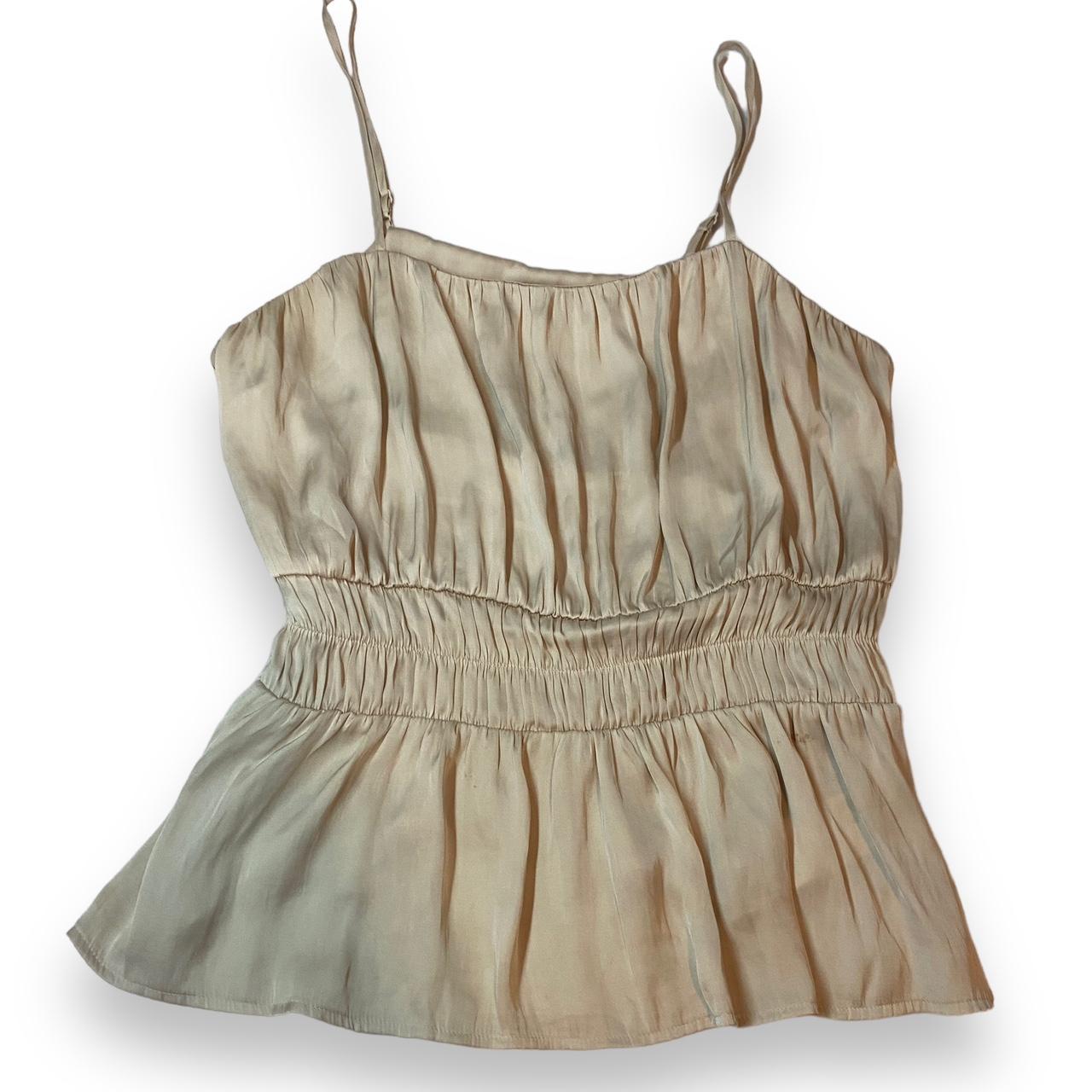 Flowy, silky cream colored cami. Elastic waistband... Depop