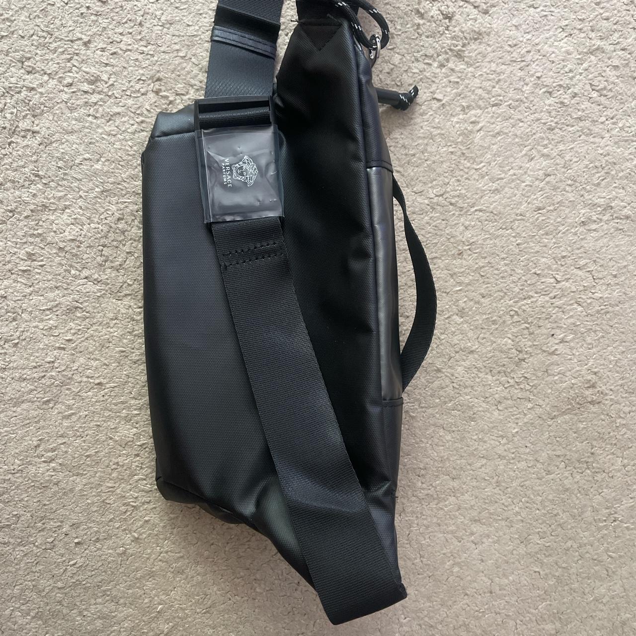 Black Versace man bag with 2 compartments never worn... Depop