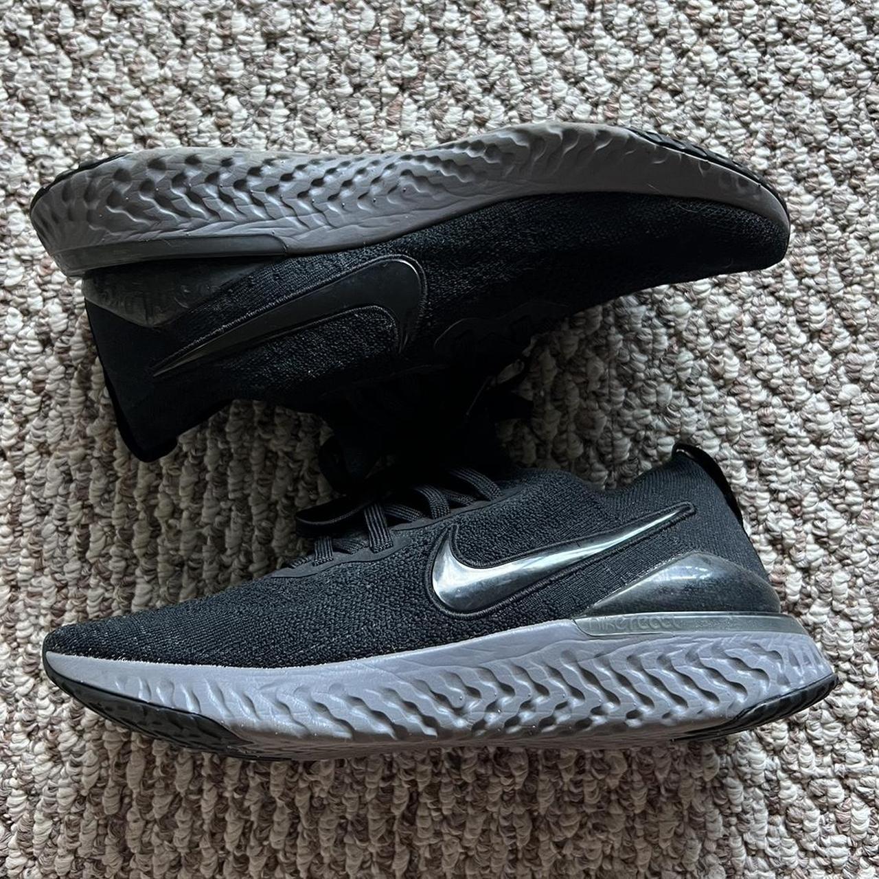 nike epic react flyknit black on feet