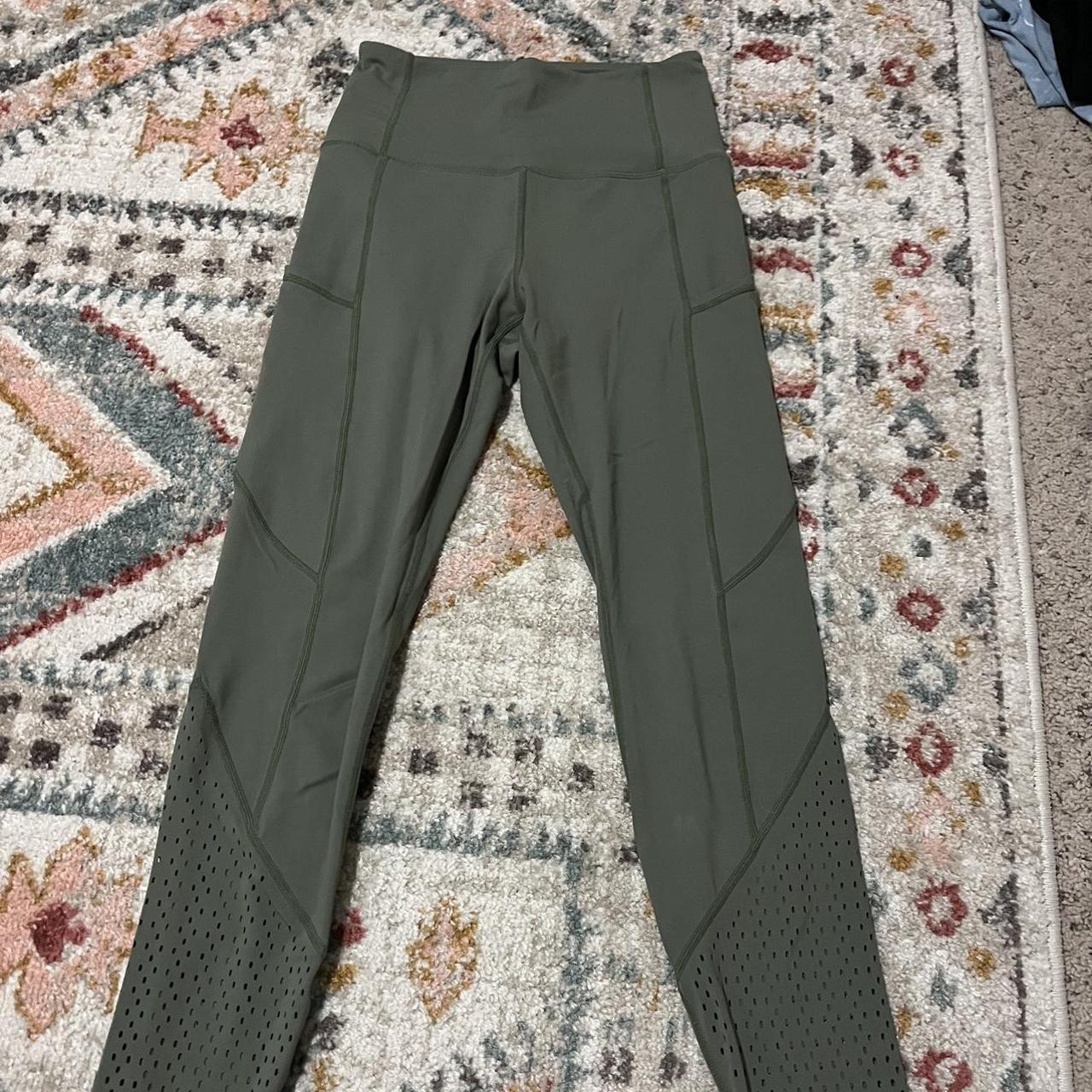 green ZYIA active leggings with tiny hole cutouts at - Depop