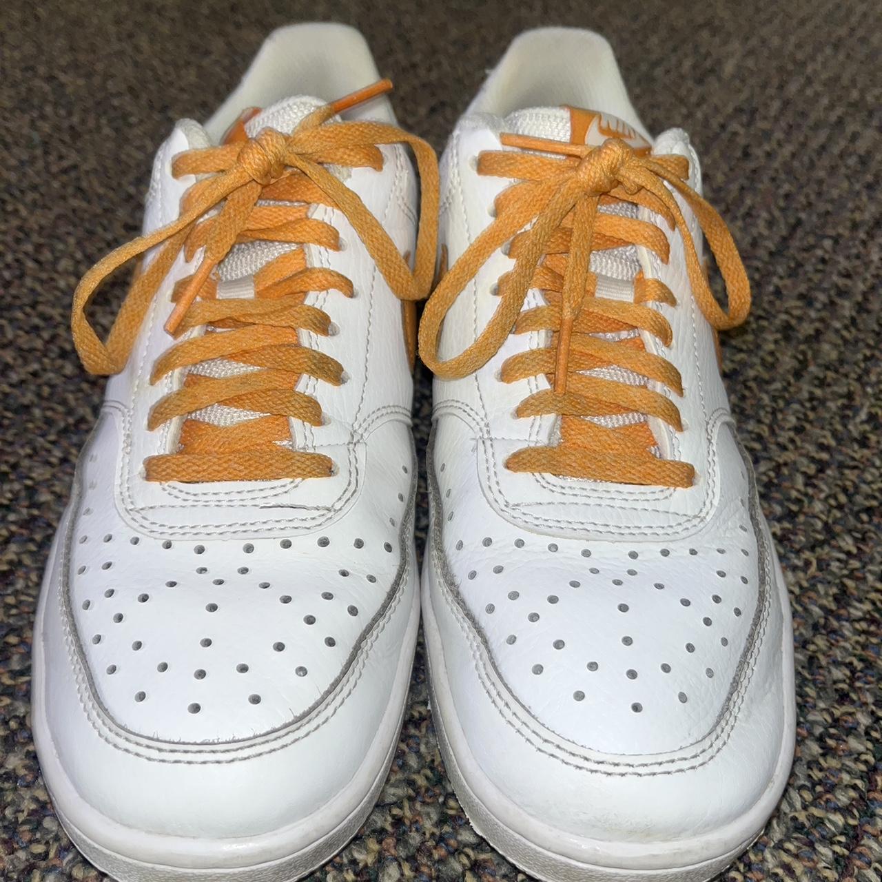 nike orange and white sneakers