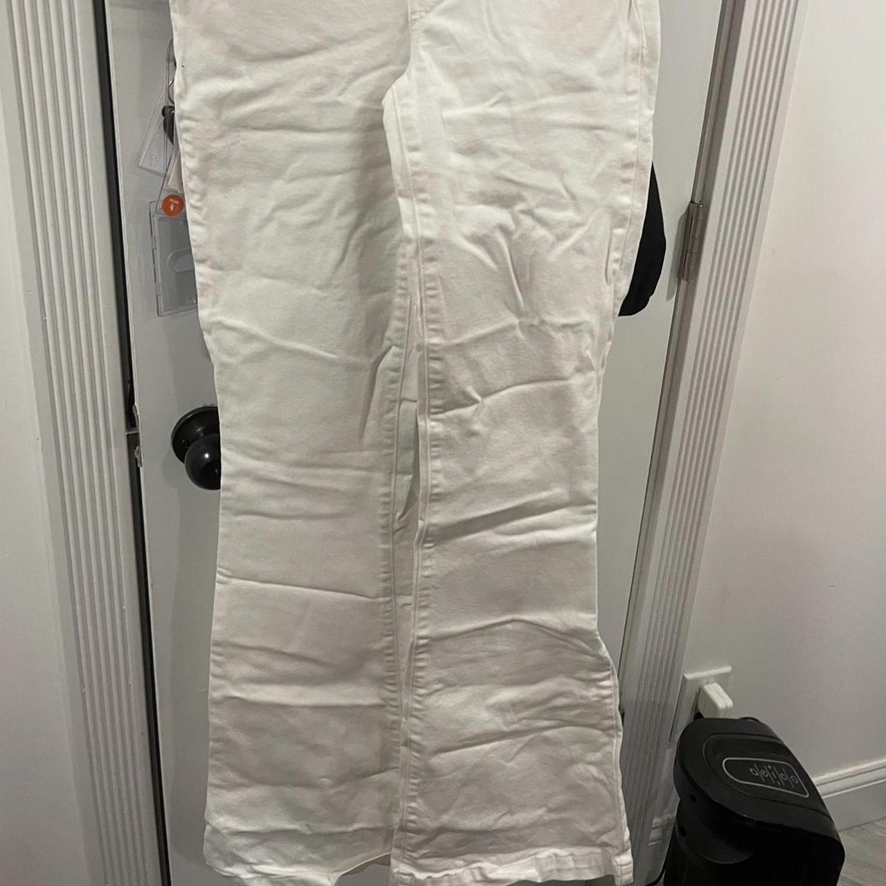 White flares with multiple buttons. Brand new, never... - Depop
