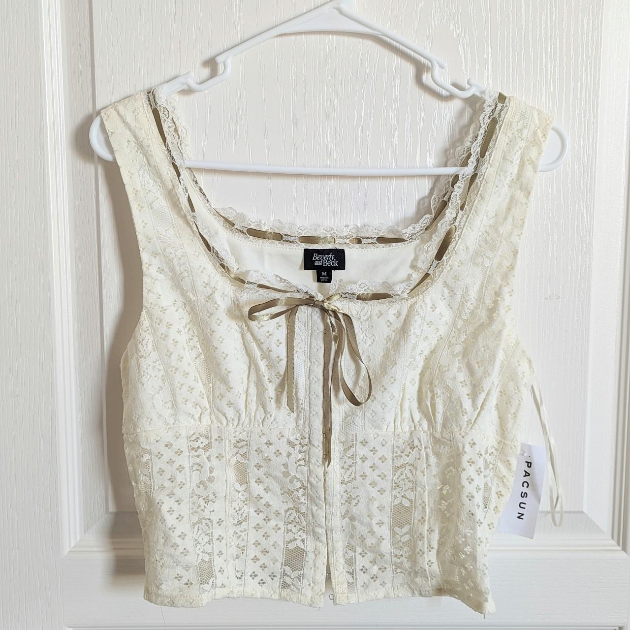 Cream lace corset top with olive green ribbon detail... Depop