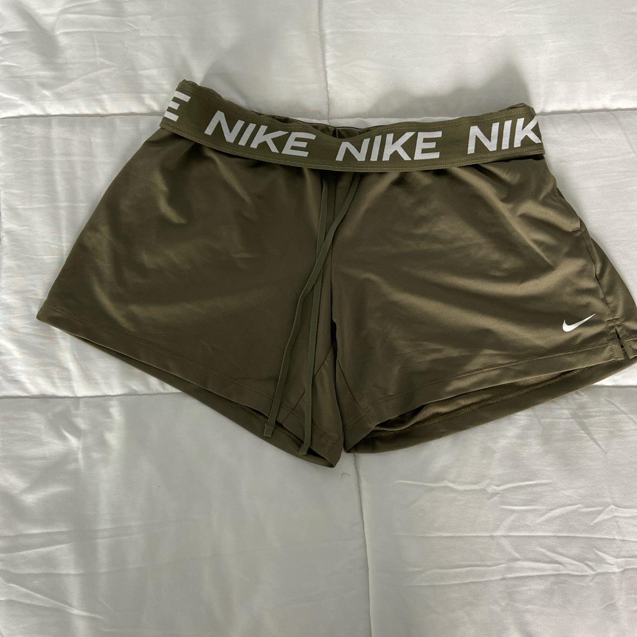 olive green nike tech shorts