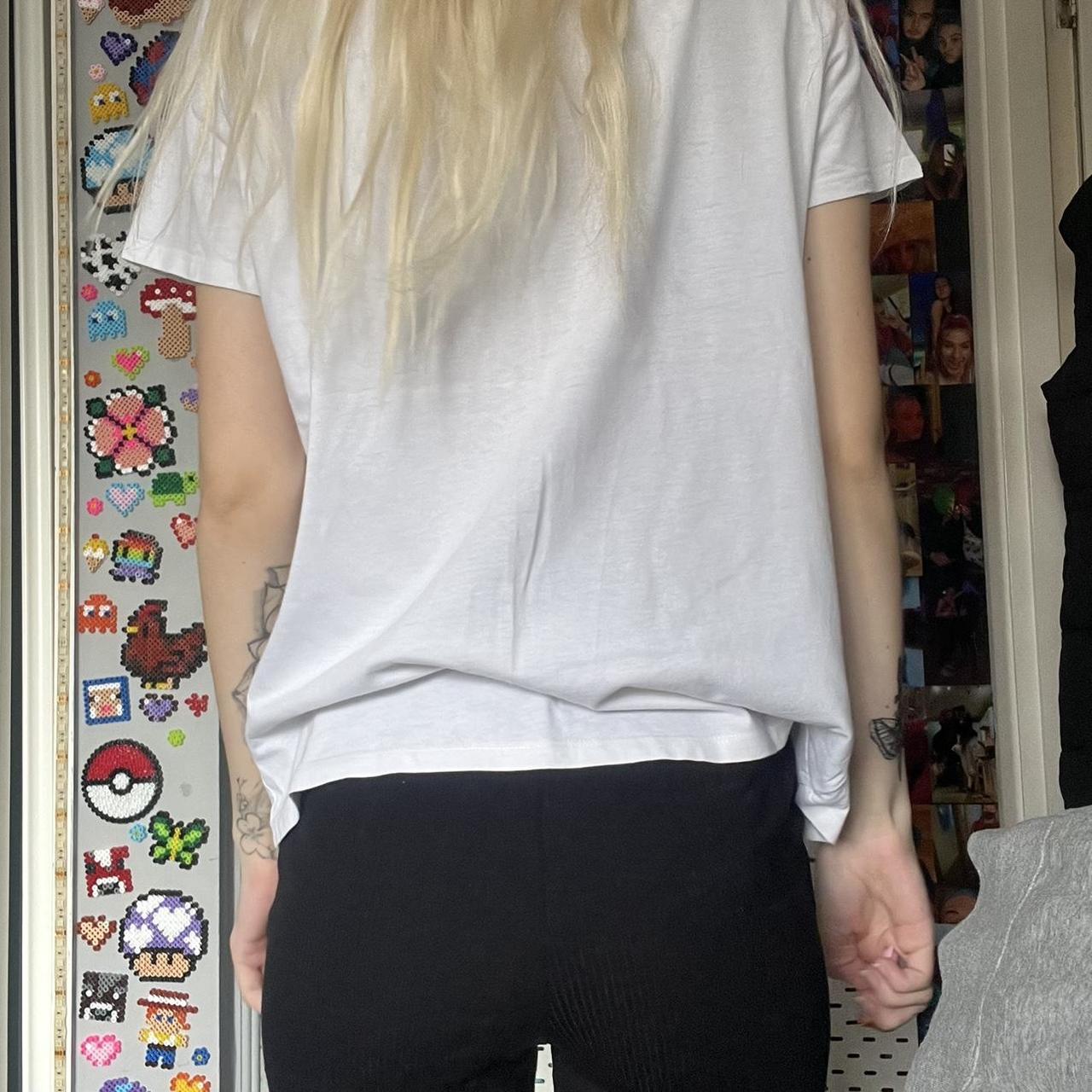 White graphic tee UK size: 10 -Worn a few times... - Depop