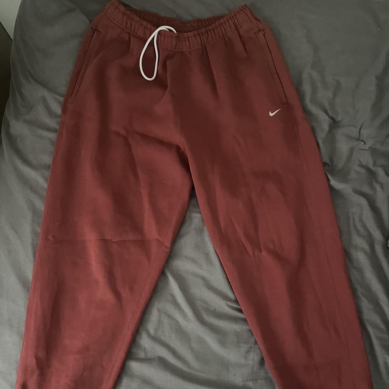 Red Nike premium essential nrg joggers No signs of... Depop