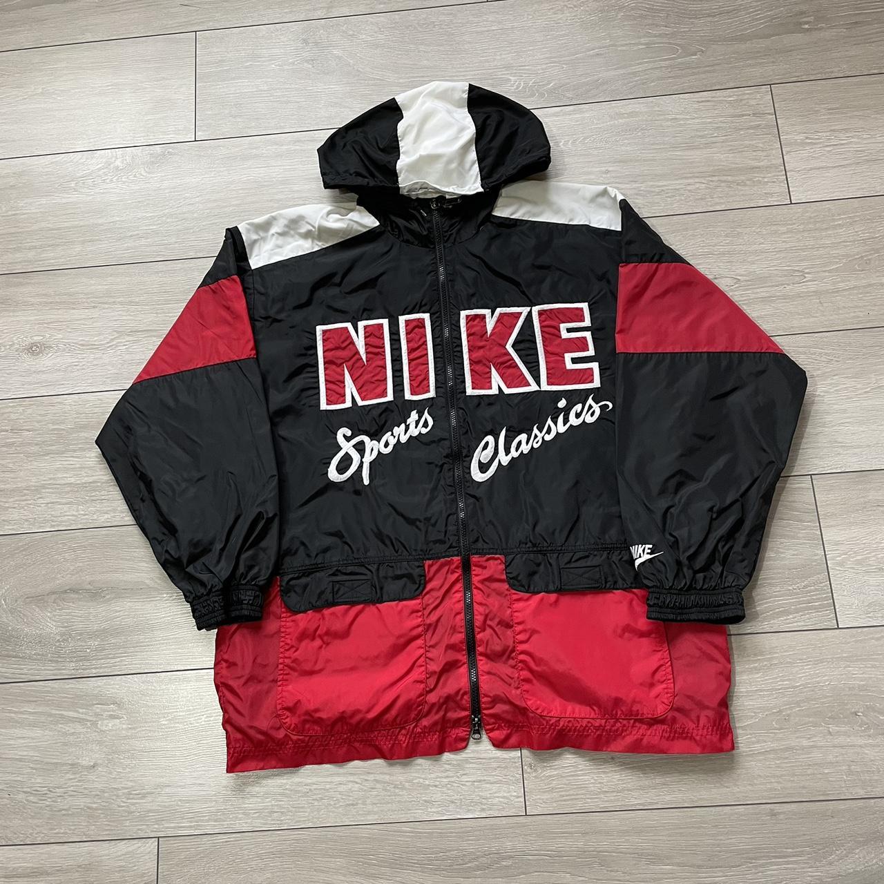 red and black nike coat