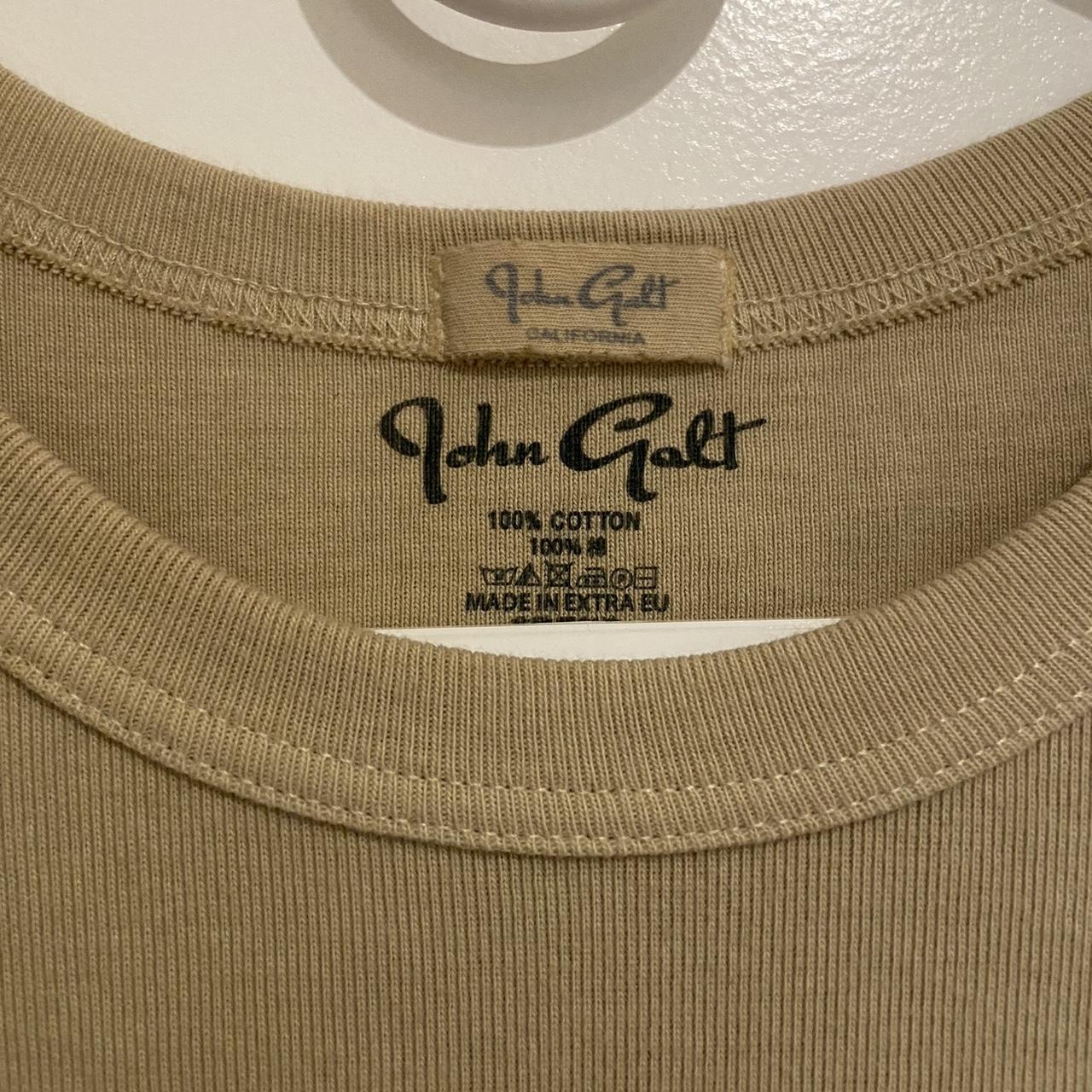 Brandy Melville John Galt Beige Baby Tshirt Only Depop