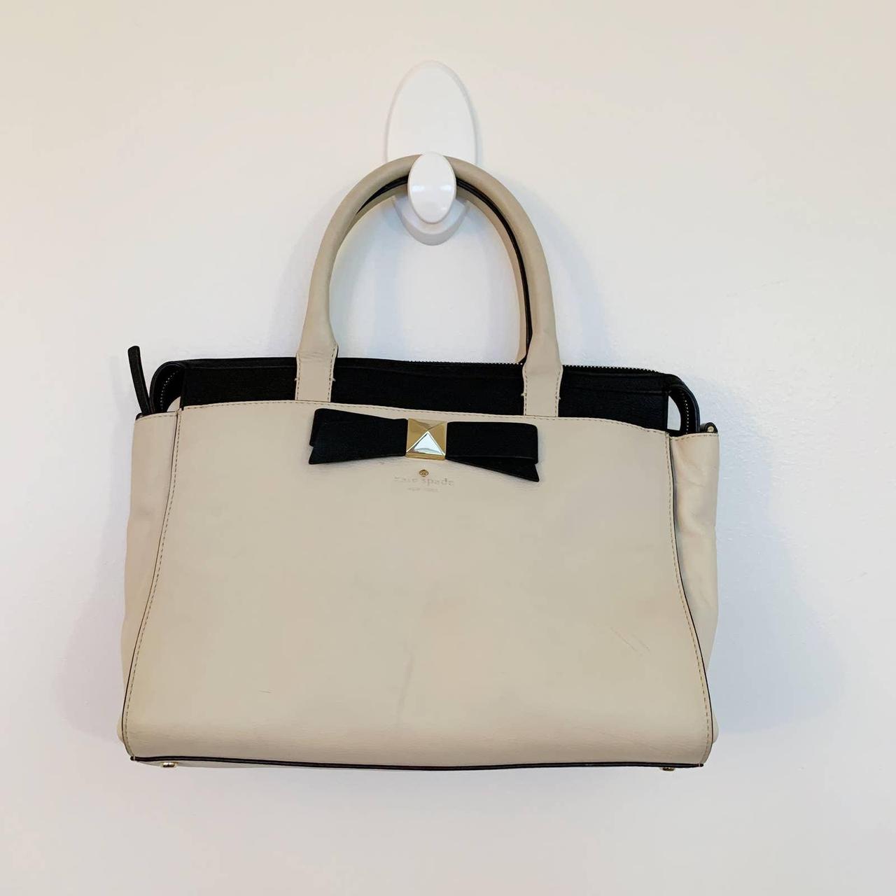 Kate spade white best sale purse with black bow