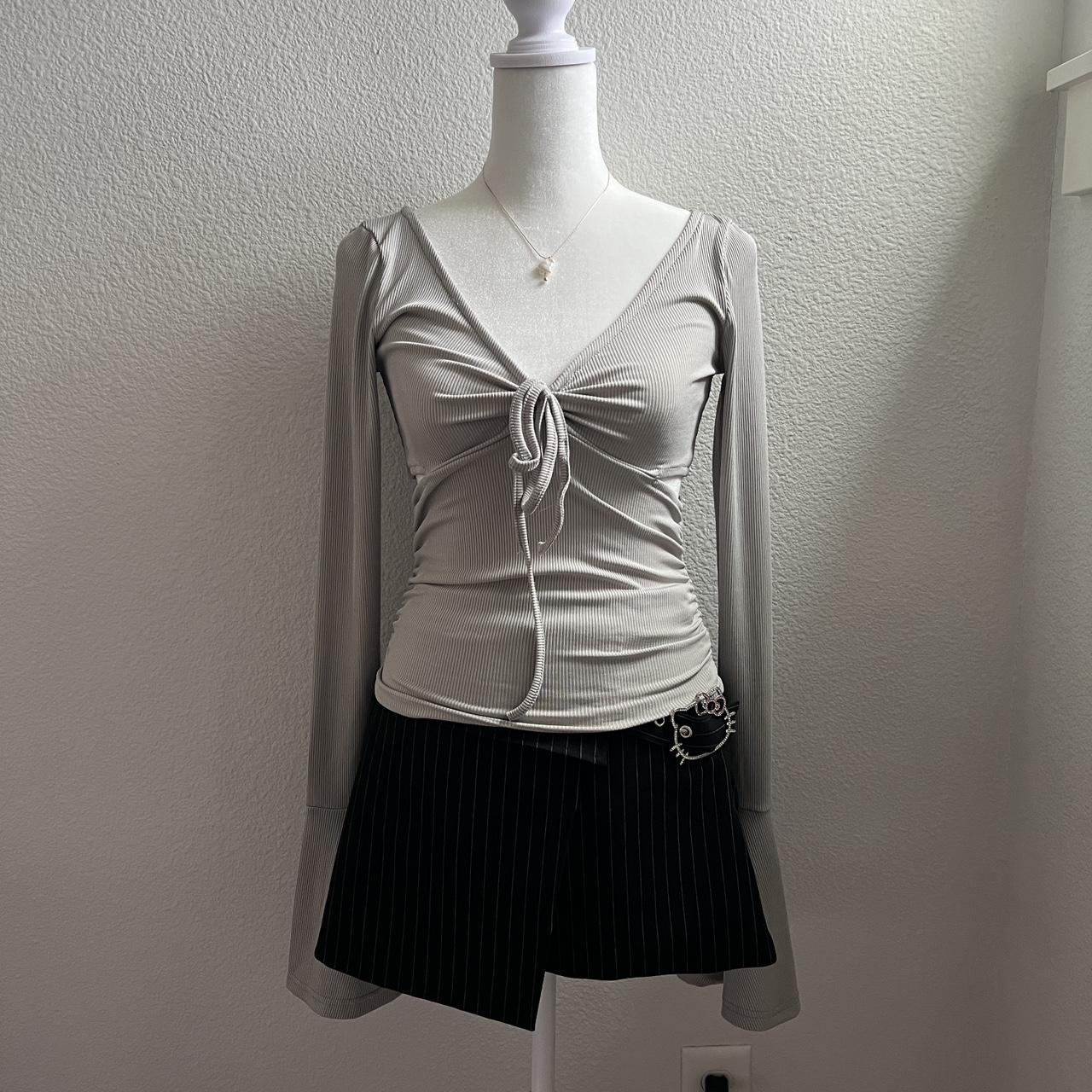 Cutest Ribbed Grey Bell Sleeve Top with Ties and... - Depop