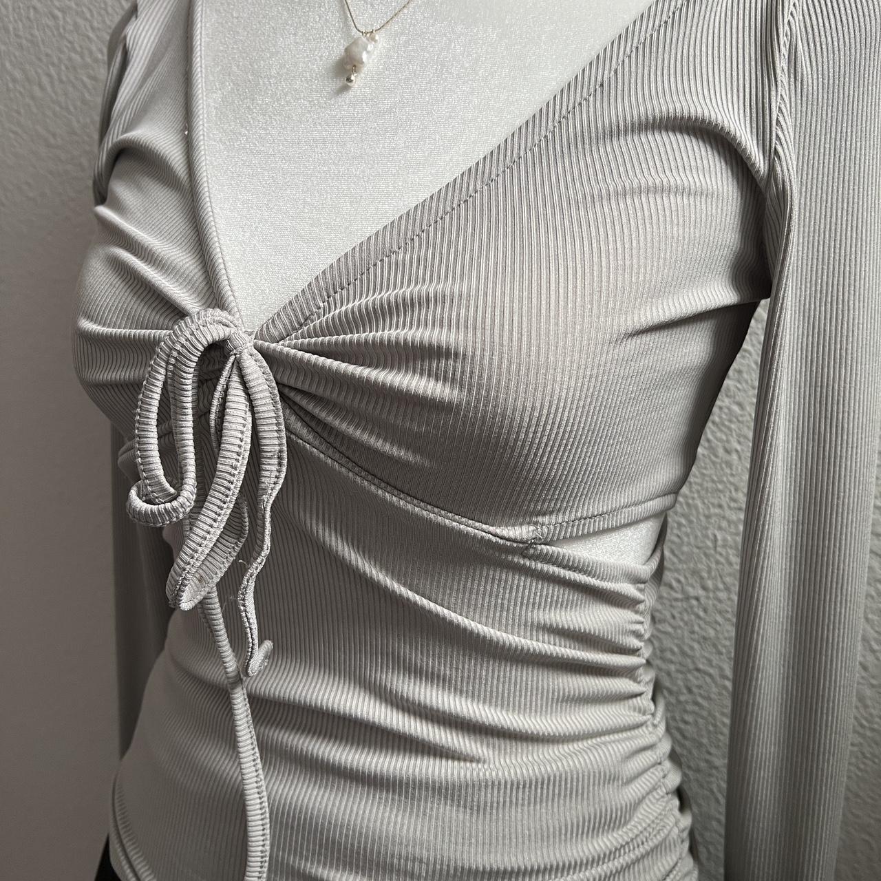 Cutest Ribbed Grey Bell Sleeve Top with Ties and... - Depop