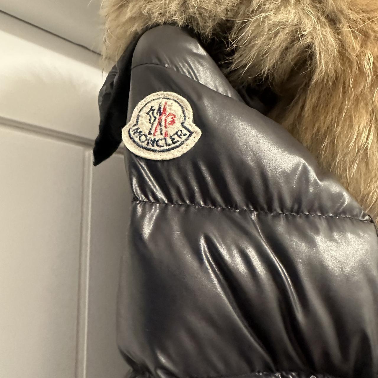 Moncler coat for sale! Second hand! Black with fur.... Depop
